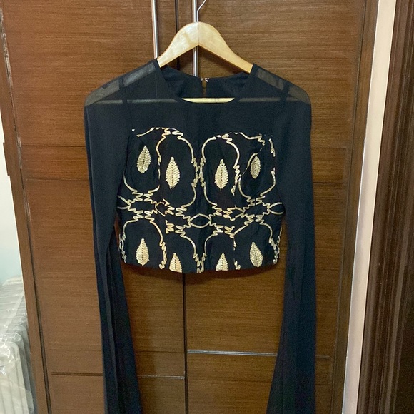 Boutique Other - Beautiful black festive top with cape sleeves